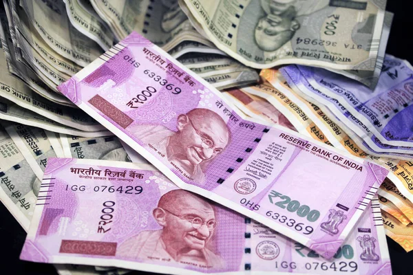 depositphotos_416986844-stock-photo-indian-currency-200-500-2000
